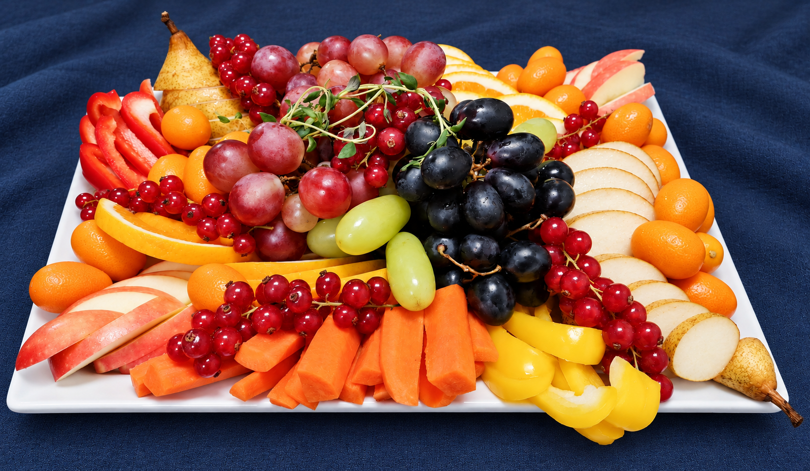 Fruit platter on a dark blue tablecloth